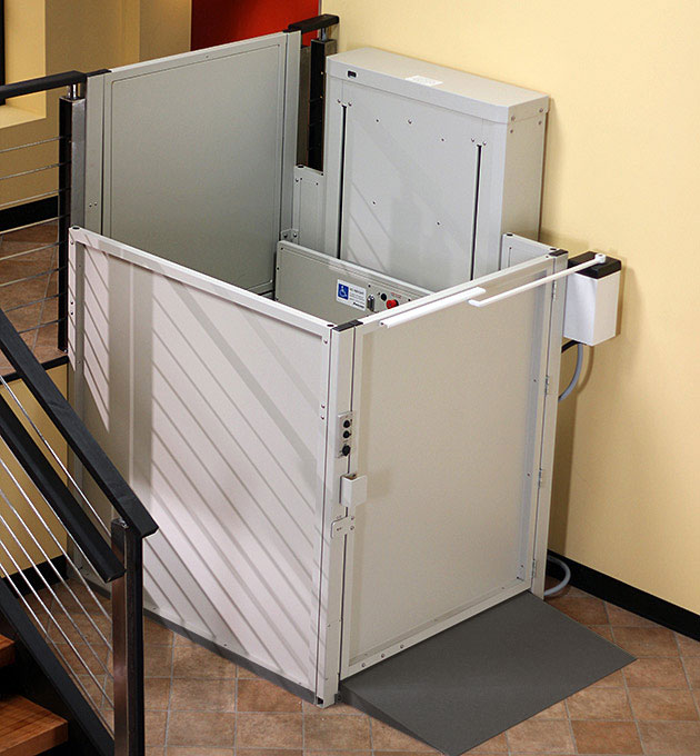 Mac's wheelchair vertical platform porch lift for mobile homes with safety gates, in Las Vegas, installed by ELECTROPEDIC